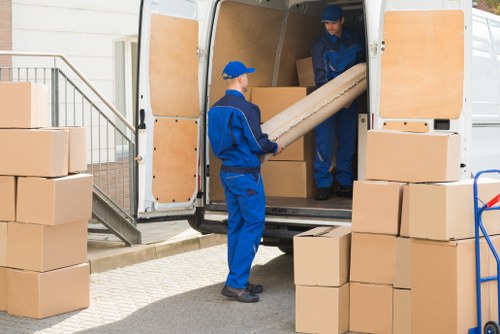 Removal team handling a move in Shoreditch street