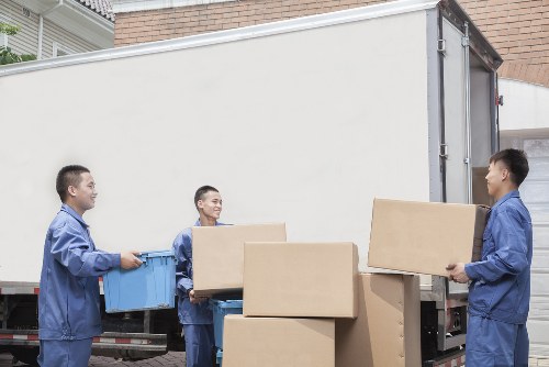 Furniture and boxes being transported with removal truck hire