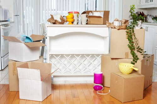 Planning office removals in Shoreditch with moving boxes and workspace setup