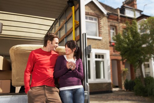 Students moving belongings into a Shoreditch flat
