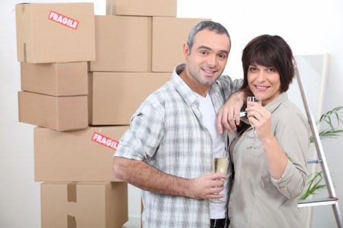 Professional movers handling furniture in a Shoreditch flat