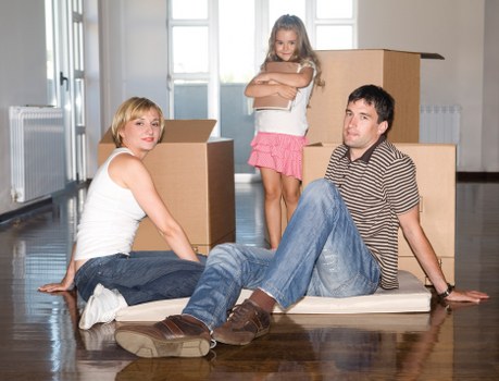 Staff using safe manual handling during furniture moving